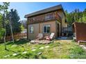 Charming two-story home with a cozy balcony, offering a peaceful outdoor retreat and lots of charm at 63 Sillasen Ln, Golden, CO 80403