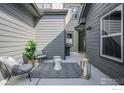 Cozy outdoor patio with stylish seating and lantern decor at 1550 Harebell St, Berthoud, CO 80513