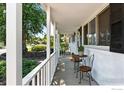 Cozy front porch with outdoor seating, perfect for relaxing and enjoying the neighborhood views at 175 Iroquois Dr, Boulder, CO 80303