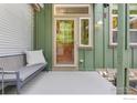 Relaxing outdoor patio space with a cozy bench, offering a serene spot to unwind at 179 Rendezvous Dr, Lafayette, CO 80026