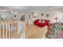 Open-concept space featuring hardwood floors and access to the kitchen, perfect for modern living at 2042 Garfield Ave, Louisville, CO 80027