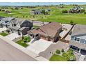 Beautiful aerial view of a house in a well-maintained neighborhood, showcasing green spaces at 1297 Black Haw St, Elizabeth, CO 80107