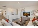 Cozy loft area with plush seating and modern design elements, creating a stylish and comfortable space at 1885 Mount Monroe Dr, Berthoud, CO 80513