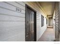 Exterior view of a unit entrance featuring the unit number and a covered walkway at 3535 28Th St # 202, Boulder, CO 80301
