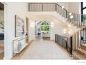 Elegant foyer with stylish decor and a view into the light-filled living space at 640 Iris Ave, Boulder, CO 80304