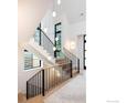 Striking staircase design with a contemporary railing and ample natural light at 640 Iris Ave, Boulder, CO 80304