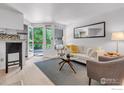 Inviting living room with a walk-out balcony and stylish furnishings at 910 Portland Pl # 7, Boulder, CO 80304