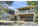 Charming home with a two-car garage, balcony, and landscaped yard at 10930 N 85Th St, Longmont, CO 80503
