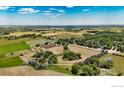 Stunning aerial shot of property featuring expansive acreage and a charming rural landscape at 2221 N 95Th St, Boulder, CO 80301
