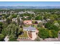 Beautiful aerial view showcasing the home, neighborhood, and stunning mountain backdrop at 2125 Rangeview Ln, Longmont, CO 80501