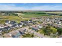 Neighborhood aerial shot offering a glimpse into the layout of the streets and the surrounding landscape at 760 Crossbill Dr, Berthoud, CO 80513