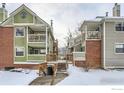 Charming exterior view of multi-level townhomes with well-maintained landscaping at 3025 Broadway St # 18, Boulder, CO 80304