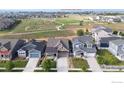 Aerial view showcasing homes near a neighborhood park at 4859 Maxwell Ave, Longmont, CO 80503