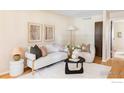 Cozy living room with modern furniture, accent pillows, and stylish floor lamp at 3393 Madison Ave # 128, Boulder, CO 80303