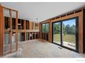 Open-concept space with sliding glass doors to backyard, allowing for customization and seamless indoor-outdoor living at 272 Lafayette St, Louisville, CO 80027