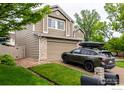 Classic two-story home with a well-maintained front yard and a two-car garage at 3101 Goldeneye Pl, Superior, CO 80027