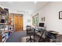 Bright home office space with large window and ample shelving at 7290 Mount Sherman Rd, Longmont, CO 80503