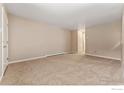 Spacious living room featuring neutral carpeting and paint to make the space your own at 830 20Th St # 203, Boulder, CO 80302