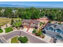 Aerial view of home showcasing its large lot, landscaping, and convenient neighborhood location at 2005 Aster Ln, Lafayette, CO 80026