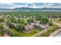Aerial view of community with lush landscaping and mountain views at 2800 Kalmia Ave # A220, Boulder, CO 80301