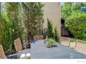 Charming outdoor dining area with well-manicured landscaping, providing a private and serene setting at 2942 Shady W Holw, Boulder, CO 80304