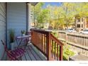 Cozy front porch featuring a small table and chairs, perfect for enjoying the neighborhood view at 1605 17Th St, Boulder, CO 80302