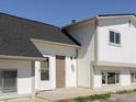 Inviting home exterior featuring a well-maintained lawn, and stylish front door at 3051 Craft Way, Westminster, CO 80030
