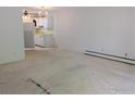 Open-concept living area with access to the kitchen at 7040 E Girard Ave # 103, Denver, CO 80224