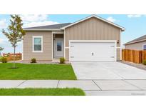 Charming single-Gathering home with a well-maintained lawn and a two-car garage at 2184 Alyssa St, Fort Lupton, CO 80621