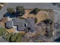 Birds eye view of charming home with mature trees and well-maintained lawn at 2605 Crabapple Ct, Golden, CO 80401