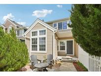 Charming home featuring a cozy front patio with seating, perfect for relaxing outdoors at 2408 Concord Cir, Lafayette, CO 80026