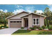 Charming single-story home featuring a mix of siding and brick, complemented by a well-manicured lawn at 6975 E 126Th Dr, Thornton, CO 80602