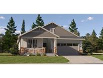 Charming single Gathering home featuring a 2-car garage, stone accents, and a well-manicured front yard at 10800 Snowdon St, Parker, CO 80134