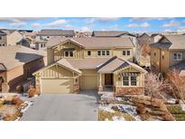 Two-story house with a large yard and attached garage at 15980 Pikes Peak Dr, Broomfield, CO 80023