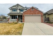 Charming two-story home with brick accents and a two-car garage at 9796 Hooker Ct, Westminster, CO 80031