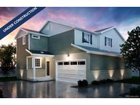 Under construction, this rendering of a two-story home features a two-car garage, welcoming porch, and neutral color palette at 22384 E 39Th Ave, Aurora, CO 80019