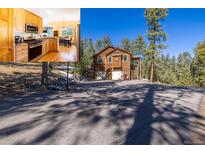 Secluded mountain home with wood siding, tall pines, and a circular driveway at 6752 S Columbine Rd, Evergreen, CO 80439