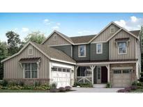 Charming two-story home boasts a stylish design with a two-car garage and inviting curb appeal at 14701 Hudson St, Thornton, CO 80602