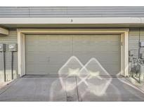 Attached one-car garage providing secure parking and additional storage space at 1920 S Hannibal St # B, Aurora, CO 80013
