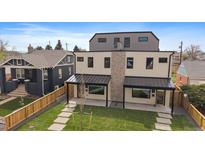 Contemporary two-story duplex with a manicured lawn and modern architectural details at 1423 Xavier St, Denver, CO 80204