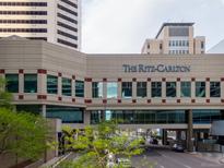 Exterior view of The Ritz-Carlton with its signage and surrounding city street at 1891 Curtis St # 1820, Denver, CO 80202