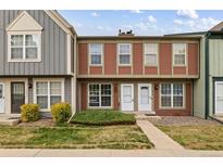 Charming townhome with well-maintained landscaping and a welcoming entrance at 1653 S Blackhawk Way # B, Aurora, CO 80012