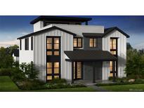 Modern farmhouse exterior with white siding, black trim, and stylish windows, showcasing a contemporary design at 2778 Utica St, Denver, CO 80212