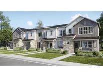 Attractive row of townhomes displaying modern design elements and beautiful exteriors at 6688 E 149Th Ave # 5, Thornton, CO 80602