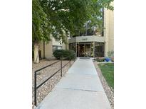 Well maintained building entrance with clean walkway and attractive landscaping at 13601 E Marina Dr # 510, Aurora, CO 80014