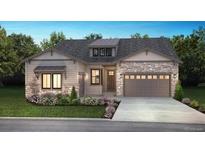 Charming single-Gathering home with stone accents, a well-manicured lawn, and a two-car garage at 11490 Autumn Moon St, Littleton, CO 80125