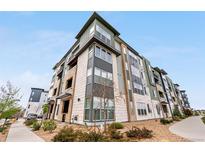 Stunning condo building featuring modern architecture and landscaping with a serene outdoor environment at 9287 Twenty Mile Rd # 204, Parker, CO 80134