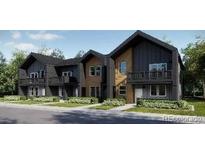 Modern townhome exteriors featuring a two-story design with beautiful architectural details at 8957 Whiteclover St, Littleton, CO 80125