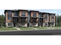 New townhouse row with modern architecture, landscaping and individual stoops at 2540 Josephine Way, Superior, CO 80027