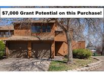 Charming two-story home with a two-car garage, mature trees, and a well-maintained front yard at 2279 E 129Th Ave, Thornton, CO 80241